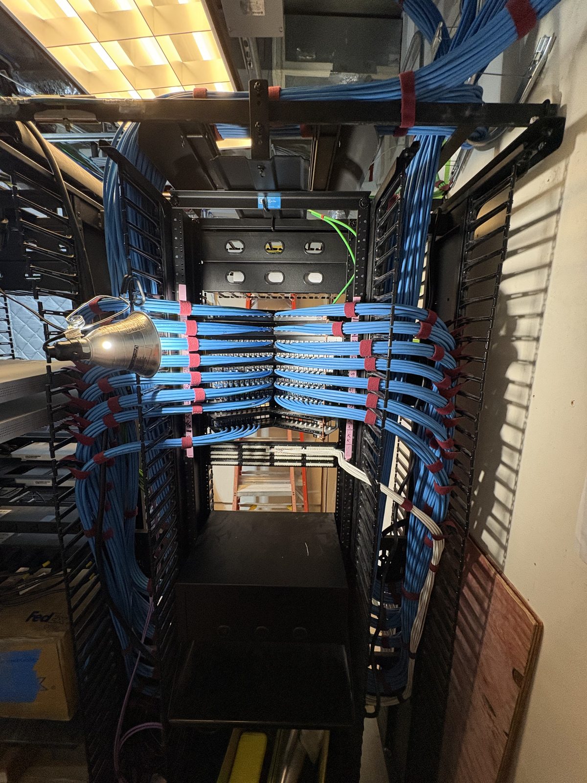 Rack rear view with organized Cat6A cabling and patch panels